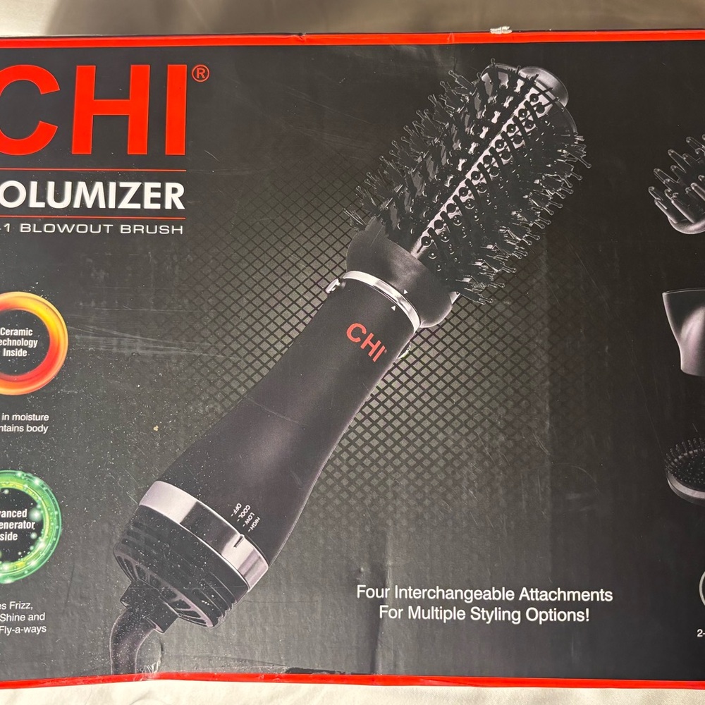 $125. CHI Black Volumizer 4-in-1 Blowout Brush top of the line. New never used!